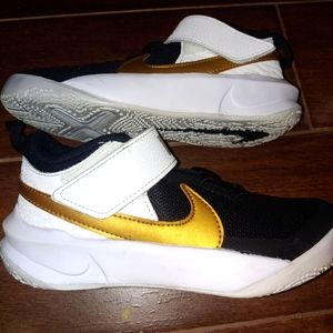 EUC Nike black with white and gold childs size 2y